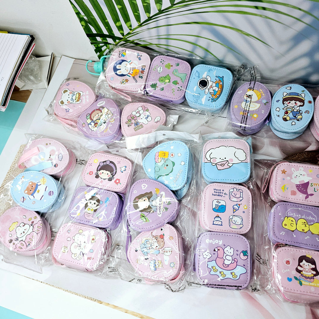 Various cartoon-themed small storage pouches for kids, featuring bunnies, chicks, and other fun designs. www.usmile.toys